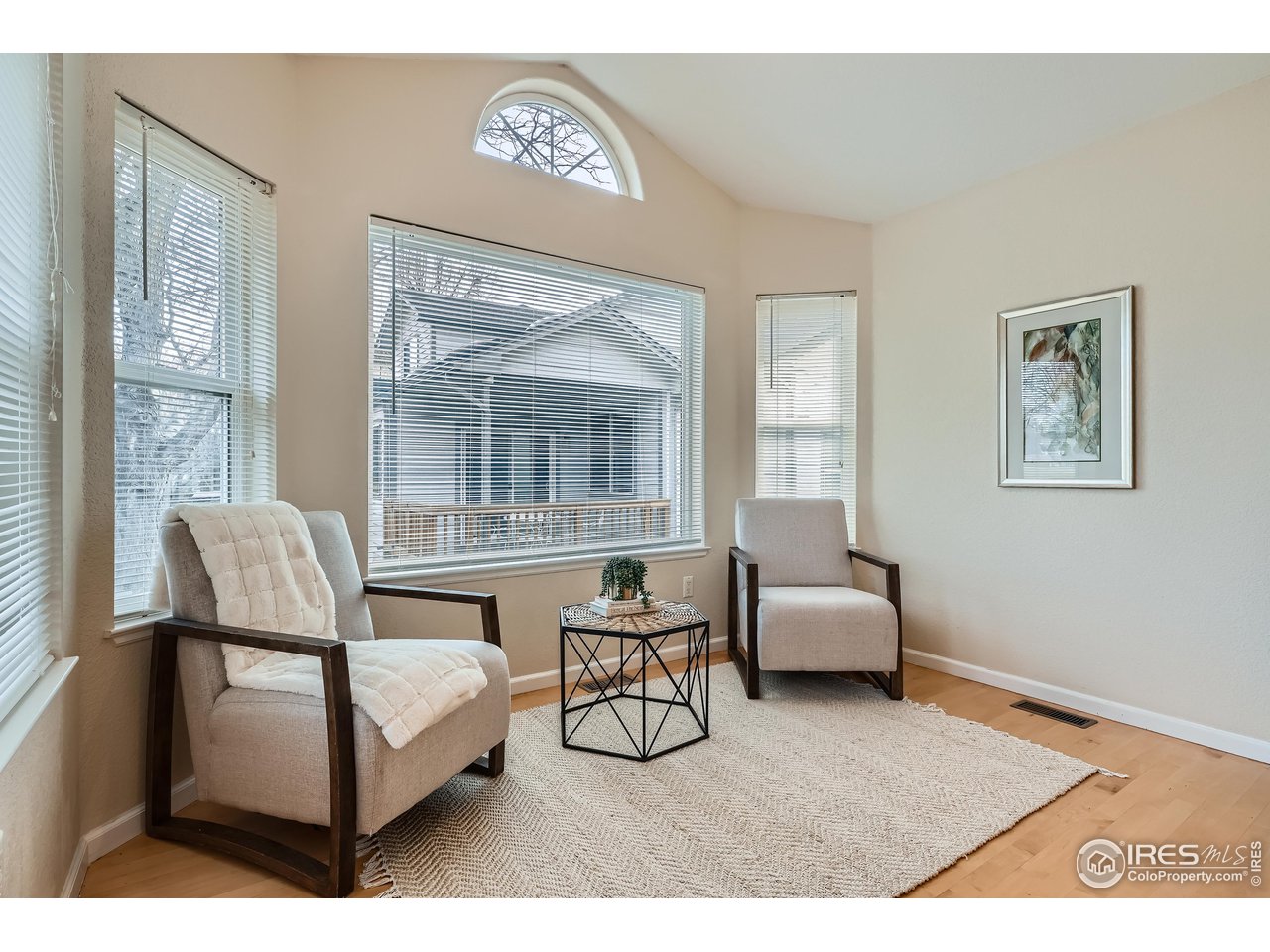 7051 Johnson Circle Niwot, CO 80503 - Photo 10 of 34 a living room with furniture and a window