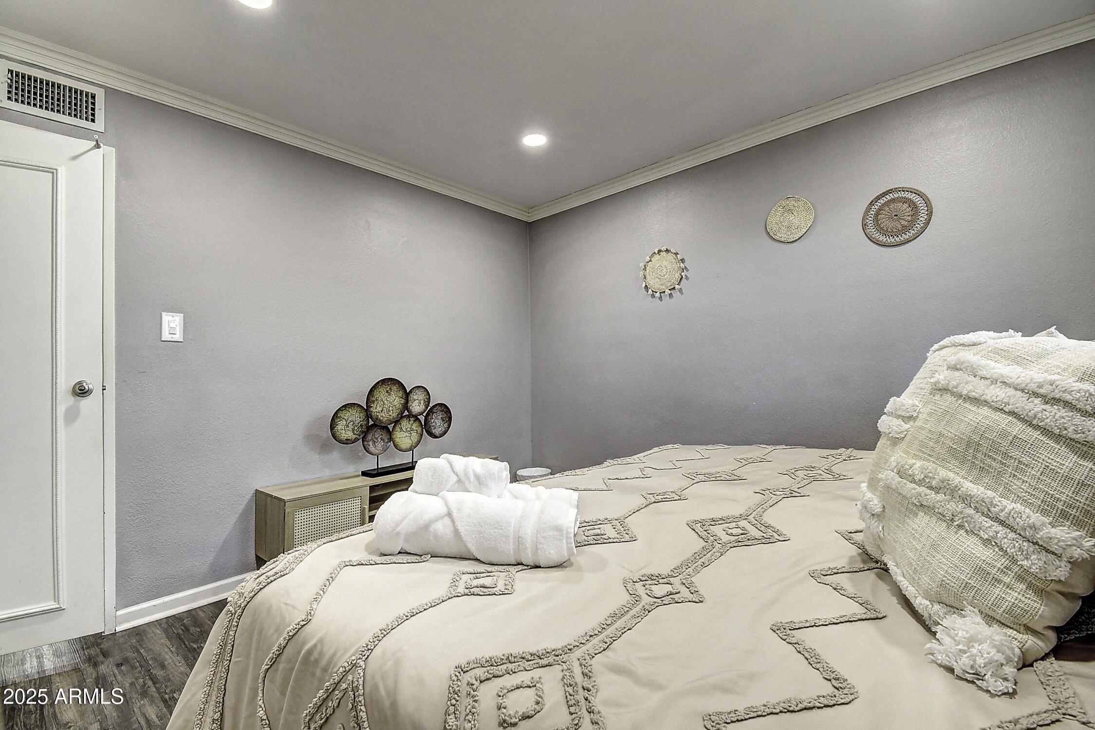 7625 East Camelback Road, Unit B203 Scottsdale, AZ 85251 - Photo 26 of 29 a bedroom with a bed and a window