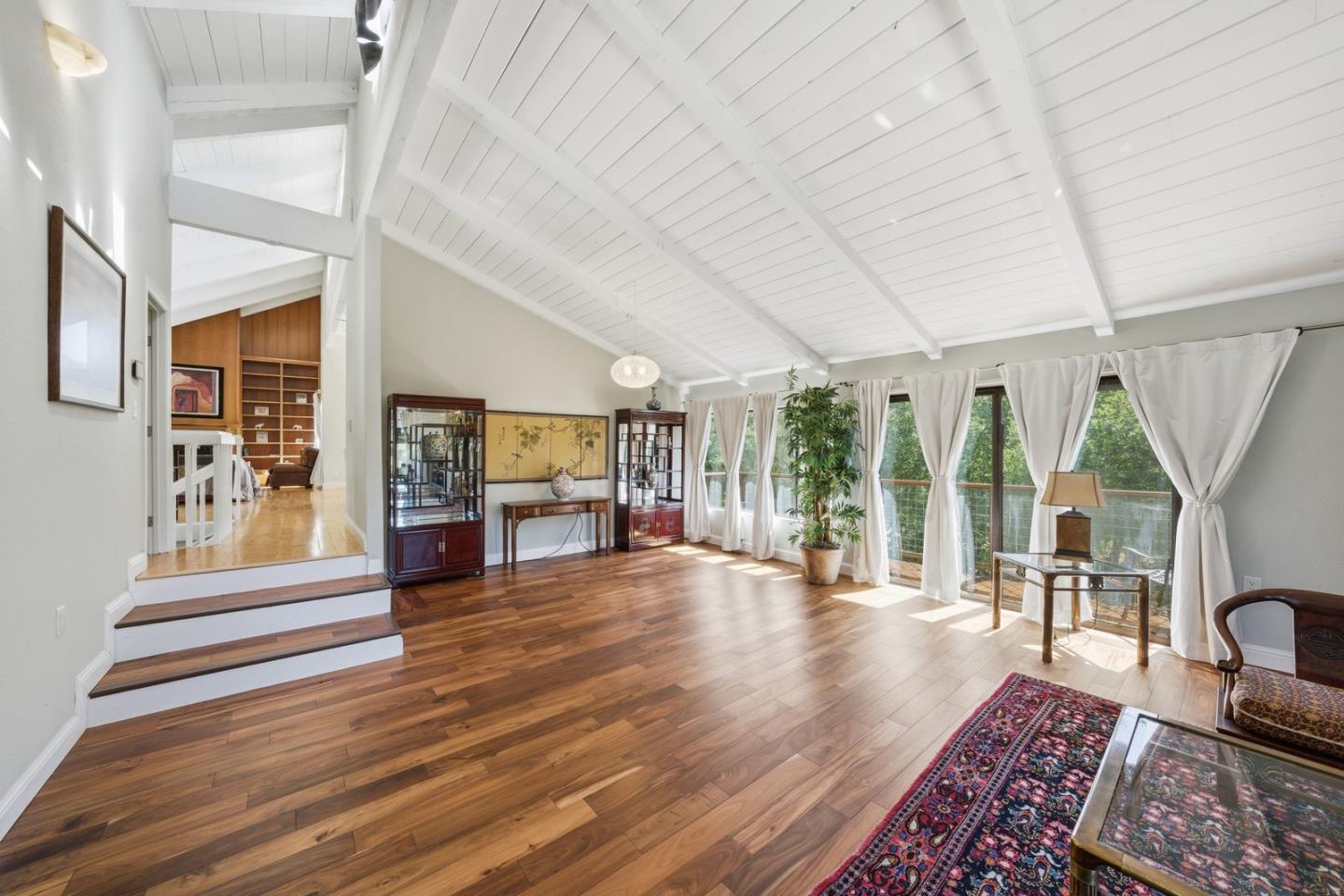 701 Day Valley Road Aptos, CA 95003 - Photo 2 of 43 a living room with furniture and a wooden floor
