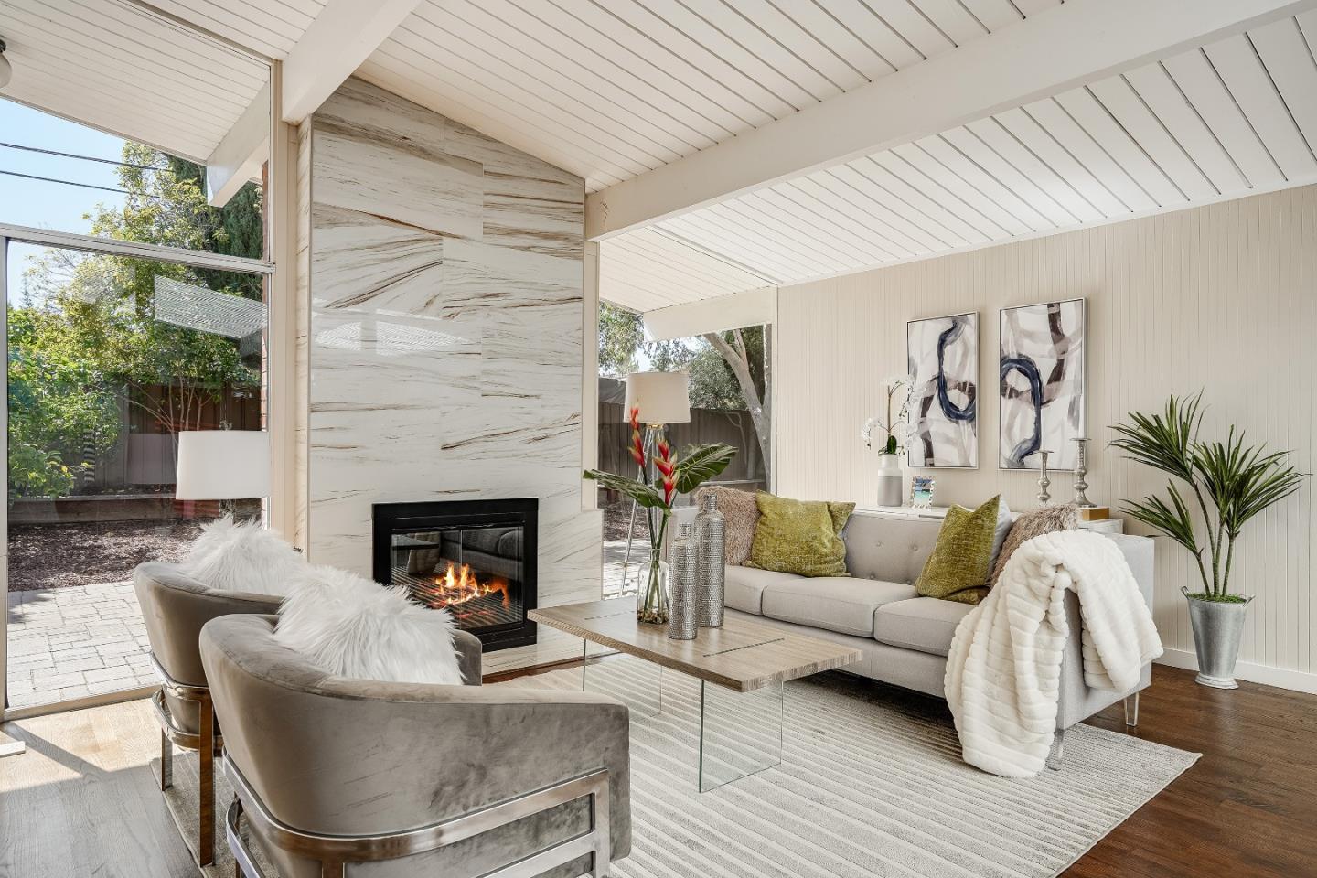 1401 South Wolfe Road Sunnyvale, CA 94087 - Photo 15 of 67 a living room with furniture and a fireplace