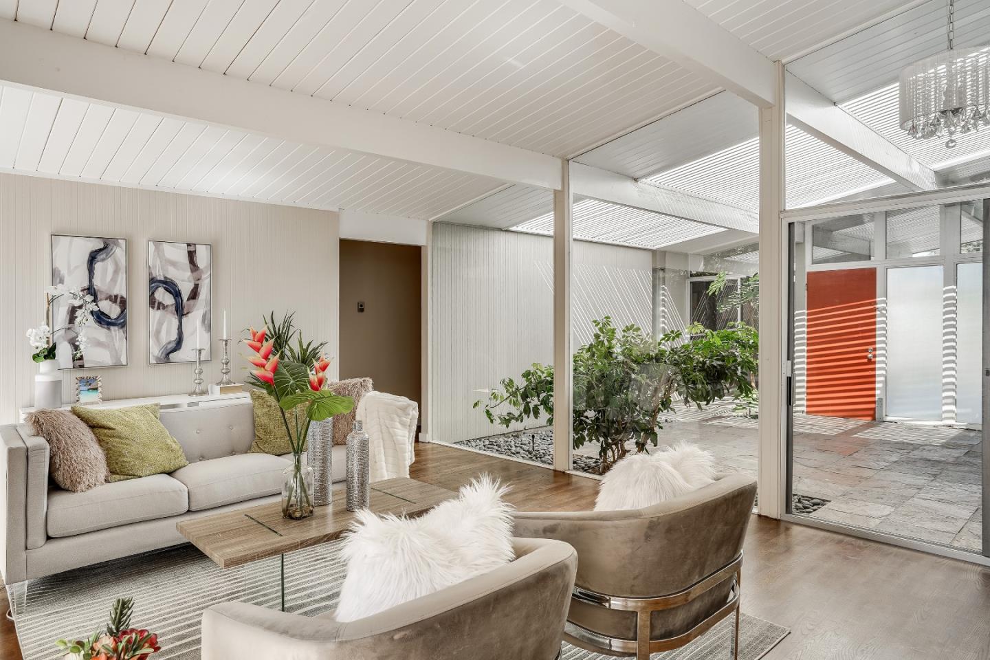 1401 South Wolfe Road Sunnyvale, CA 94087 - Photo 17 of 67 a living room with furniture and a potted plant