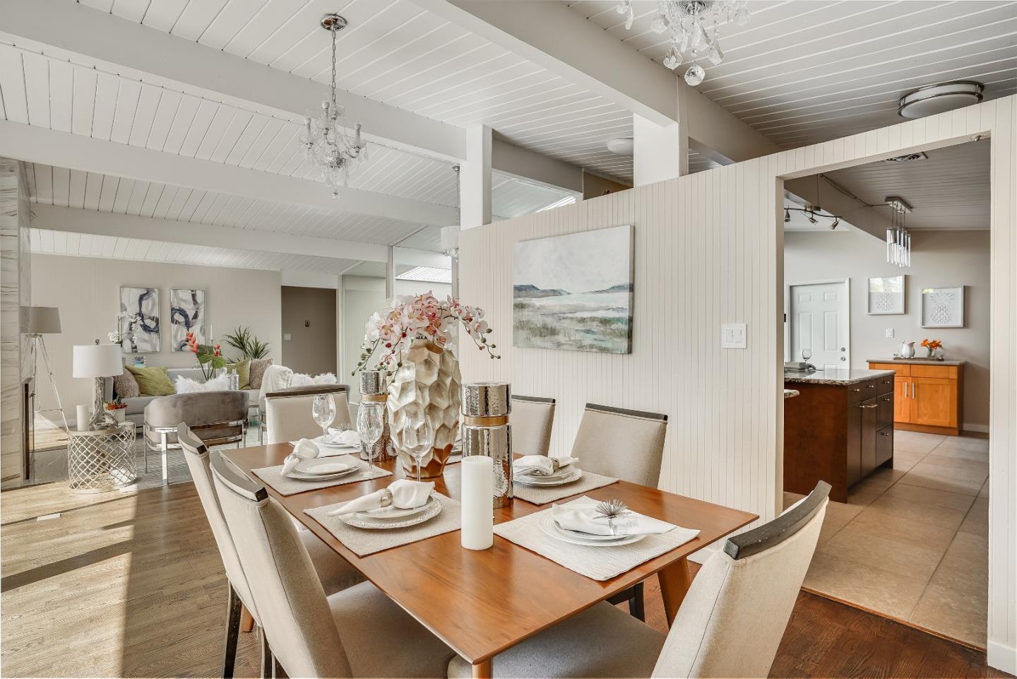1401 South Wolfe Road Sunnyvale, CA 94087 - Photo 25 of 67 a dining room with furniture a kitchen and chandelier
