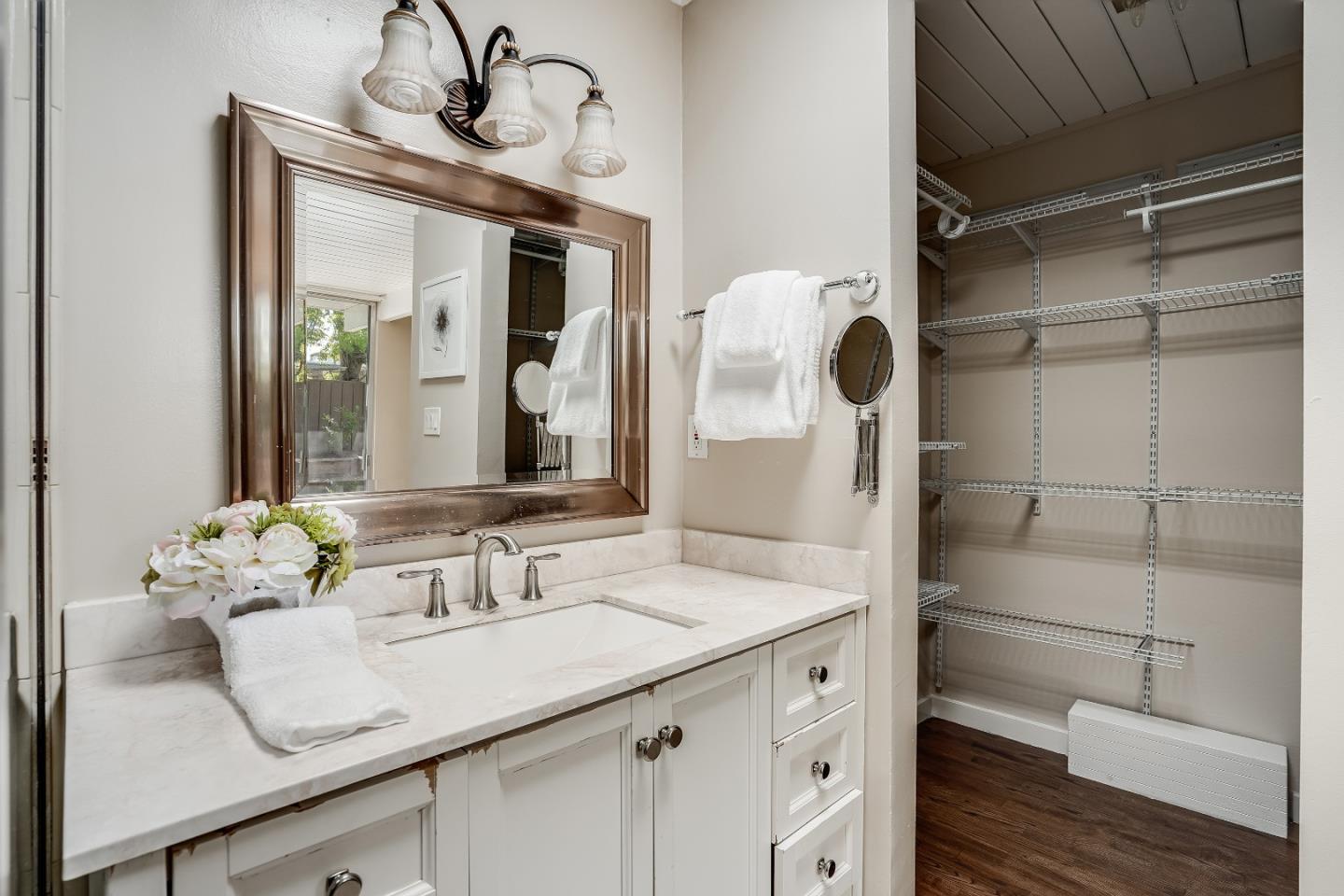 1401 South Wolfe Road Sunnyvale, CA 94087 - Photo 41 of 67 a bathroom with a sink and a mirror