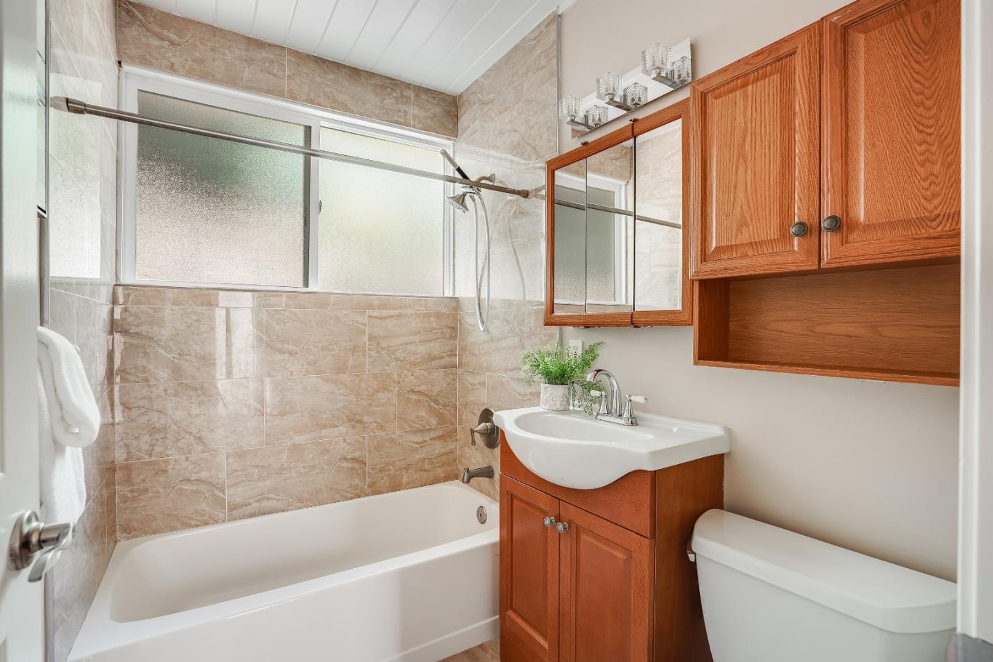 1401 South Wolfe Road Sunnyvale, CA 94087 - Photo 47 of 67 a bathroom with a sink a toilet and shower