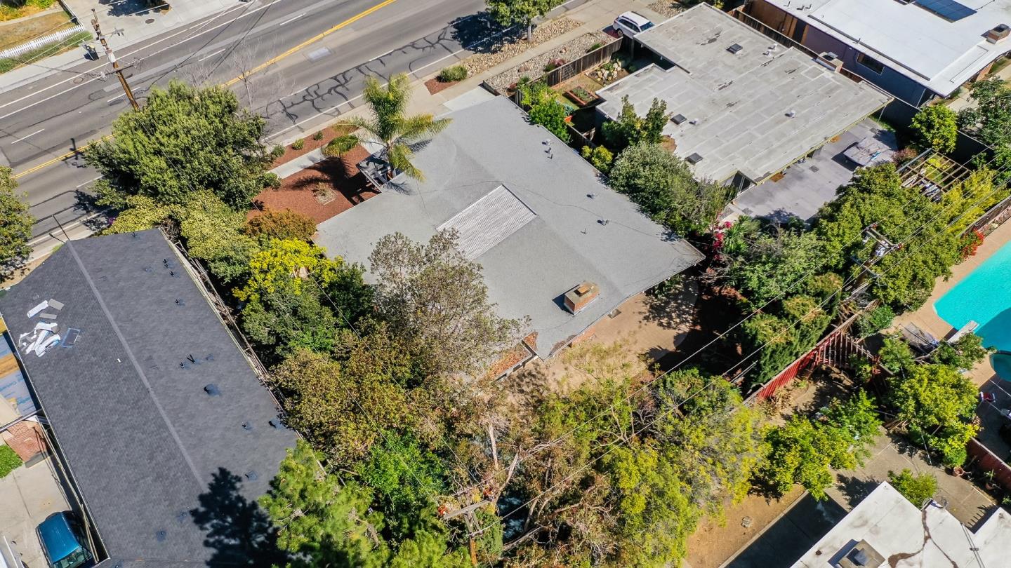 1401 South Wolfe Road Sunnyvale, CA 94087 - Photo 65 of 67 an aerial view of a house with a yard and garden