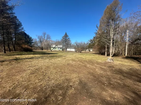 a view of an outdoor space and a yard