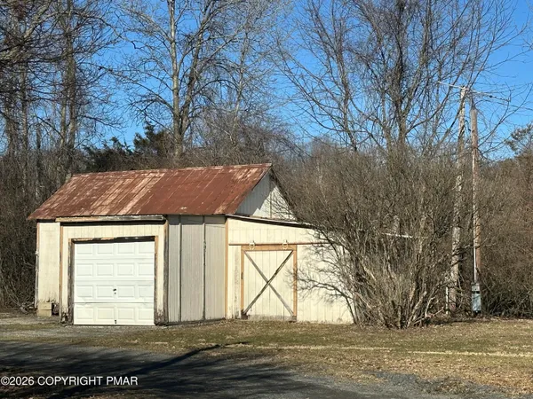 a house with trees in front of it
