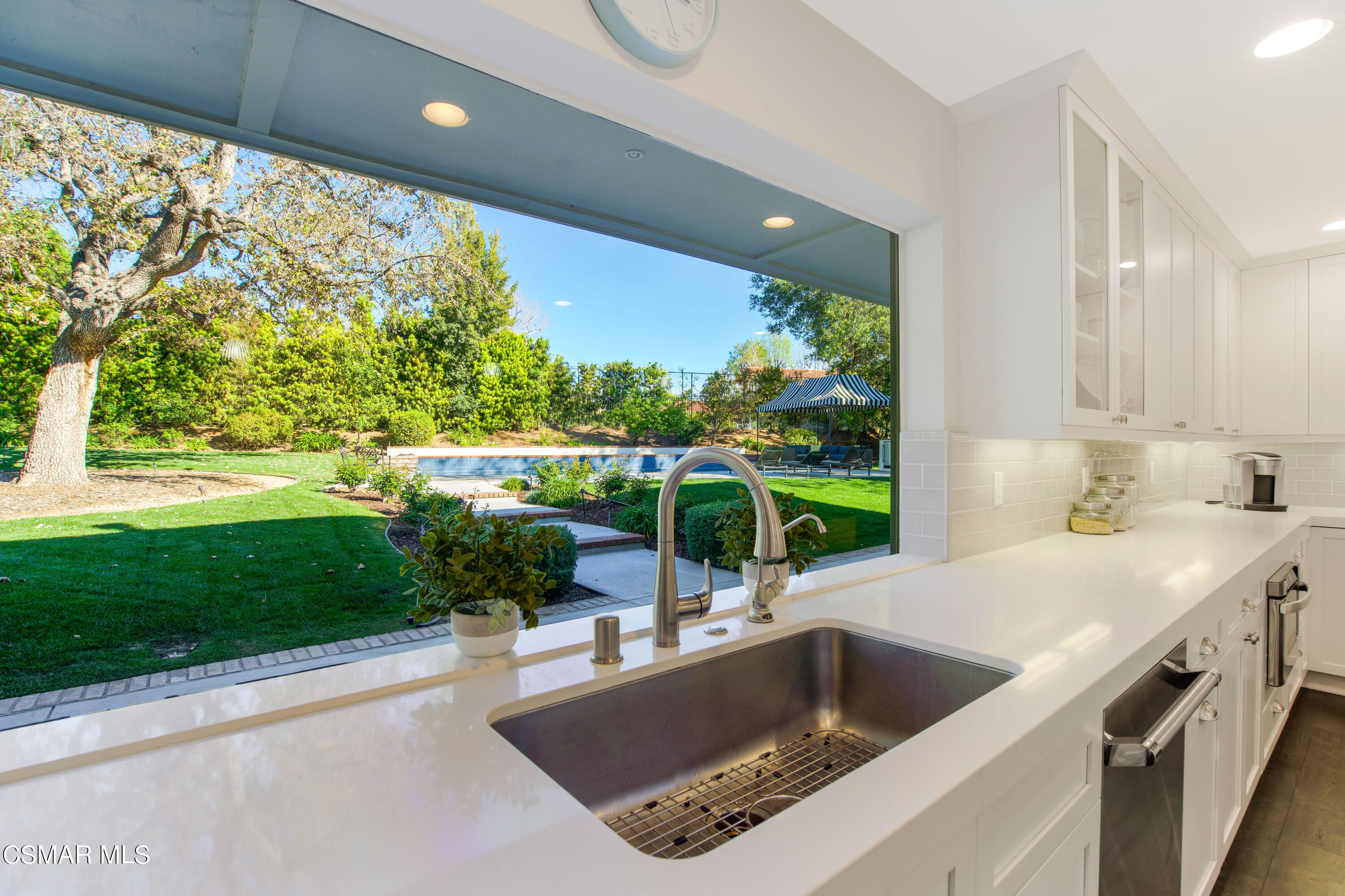 1752 Upper Ranch Road Westlake Village, CA 91362 - Photo 14 of 37 a kitchen with a sink and a large window