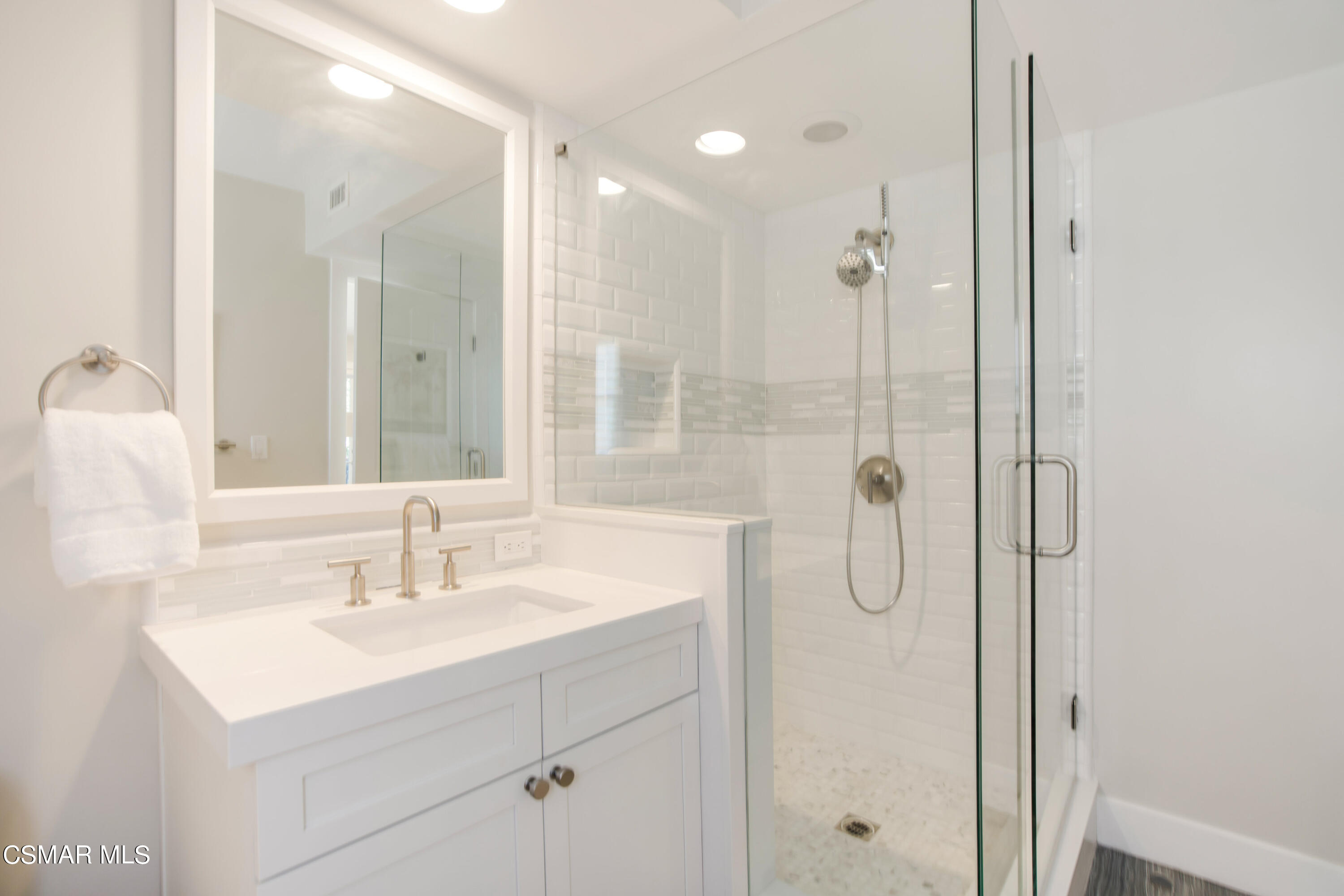 1752 Upper Ranch Road Westlake Village, CA 91362 - Photo 16 of 37 a bathroom with a shower sink and mirror
