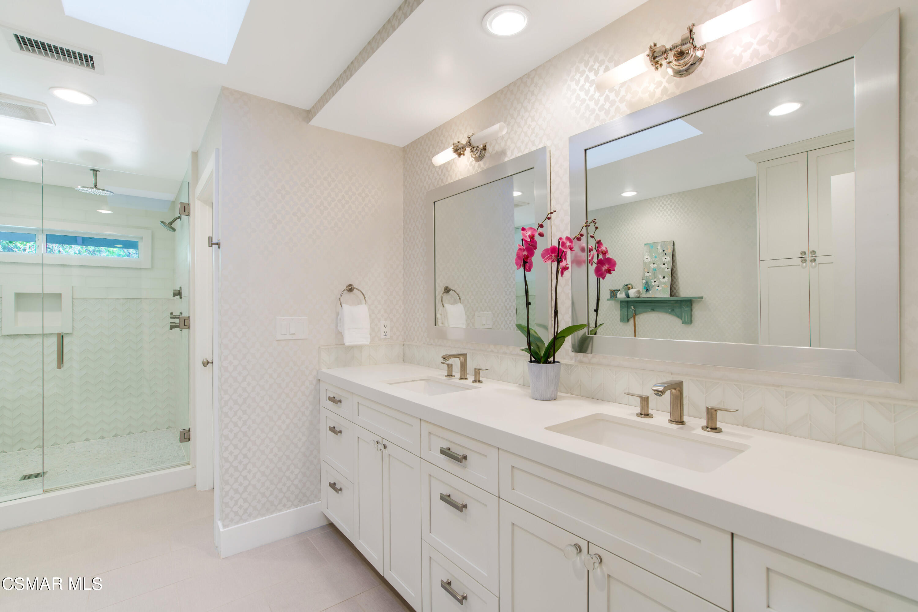 1752 Upper Ranch Road Westlake Village, CA 91362 - Photo 23 of 37 a bathroom with a shower sink large mirror and