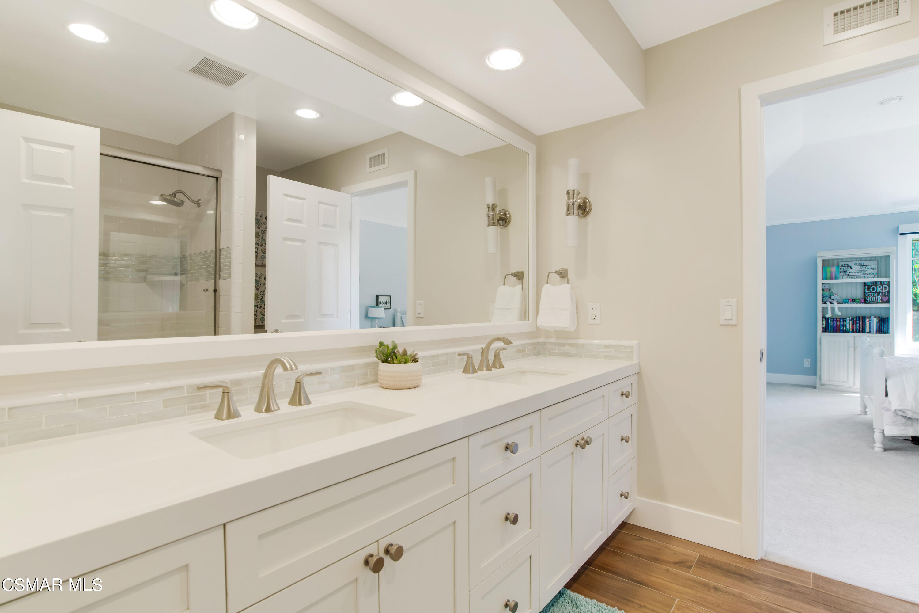 1752 Upper Ranch Road Westlake Village, CA 91362 - Photo 26 of 37 a spacious bathroom with a double vanity sink double and mirror