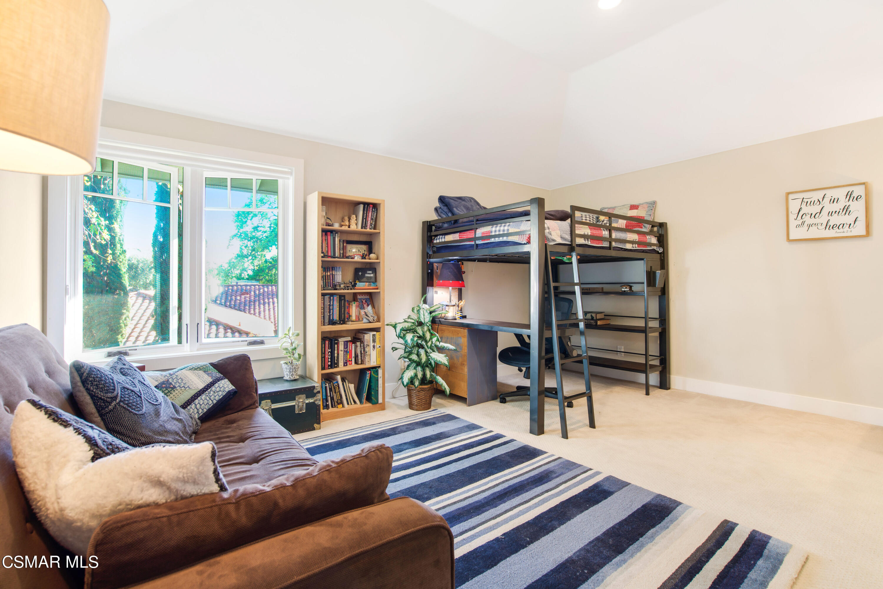1752 Upper Ranch Road Westlake Village, CA 91362 - Photo 27 of 37 a living room with furniture a fireplace and large windows