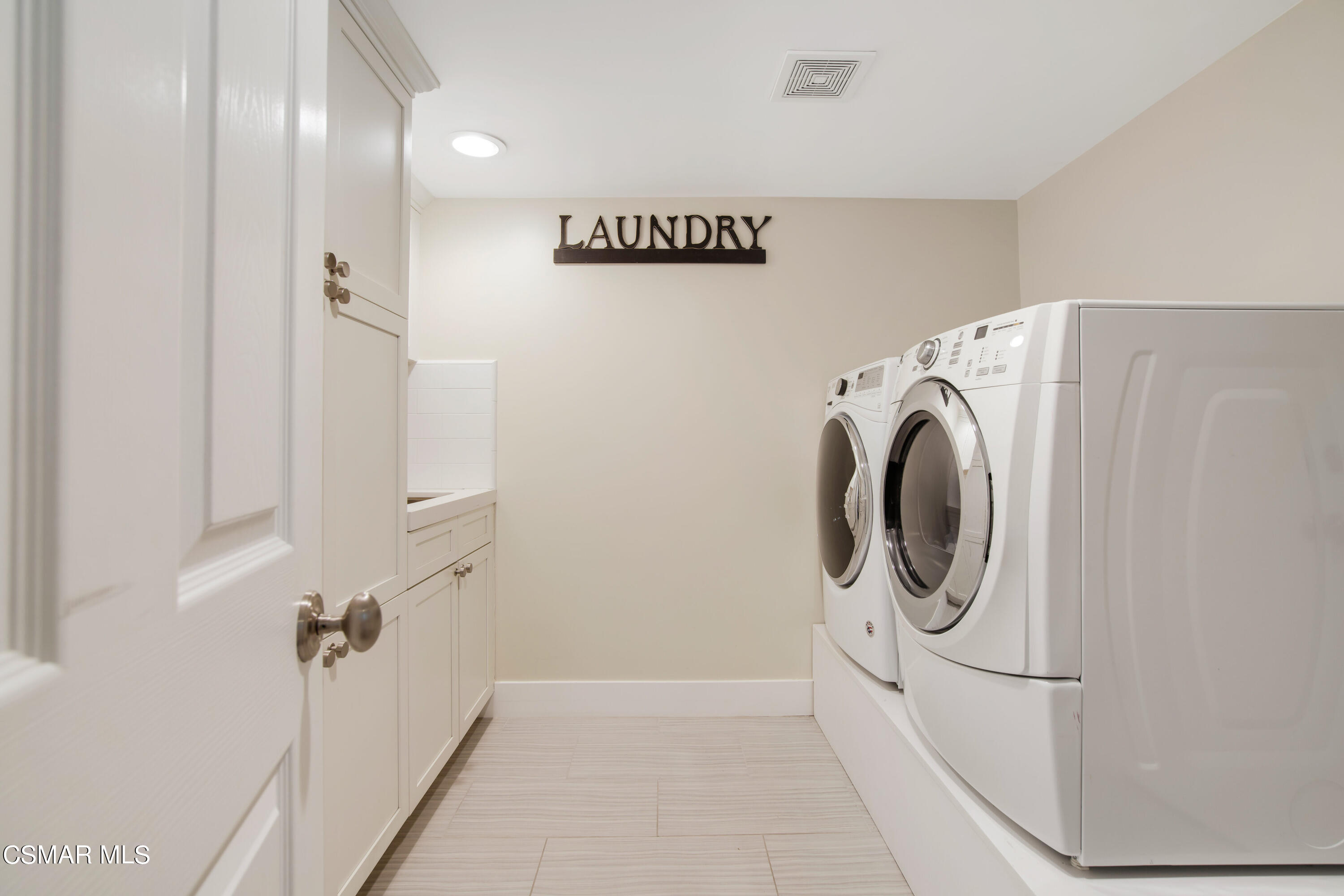 1752 Upper Ranch Road Westlake Village, CA 91362 - Photo 35 of 37 a view of a storage & utility room with a washer dryer