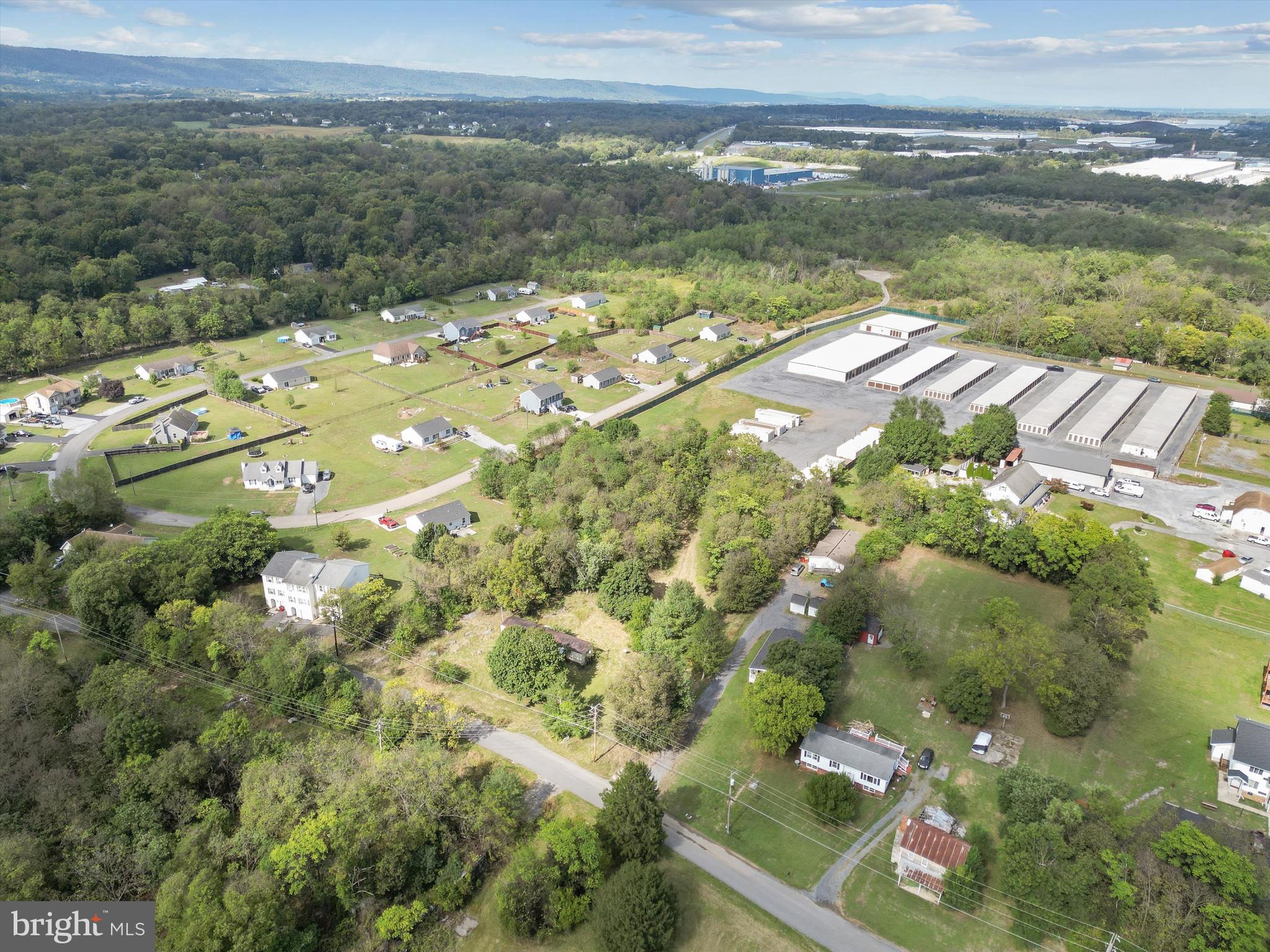 100 Washington Street Inwood, WV 25428 - Photo 11 of 15 a view of a lake with a yard