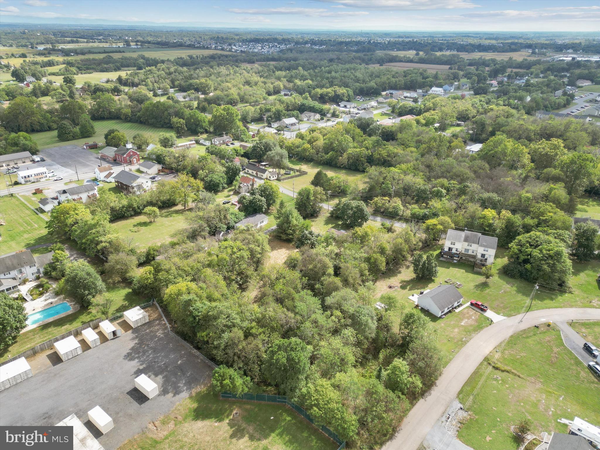 100 Washington Street Inwood, WV 25428 - Photo 13 of 15 a view of a city with ocean view