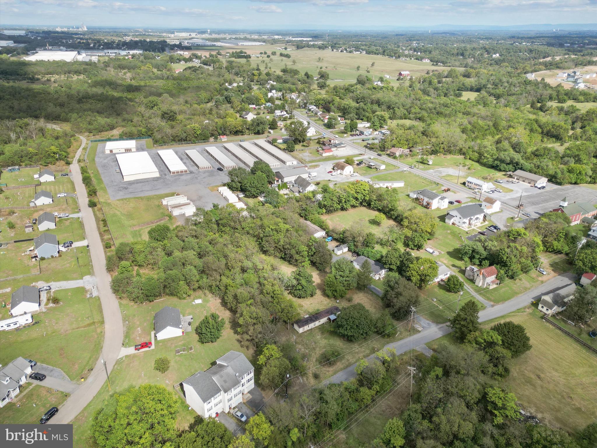 100 Washington Street Inwood, WV 25428 - Photo 10 of 15 an aerial view of residential houses with outdoor space
