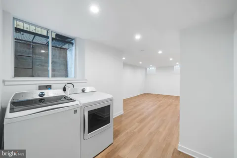 a kitchen with a stove and a sink