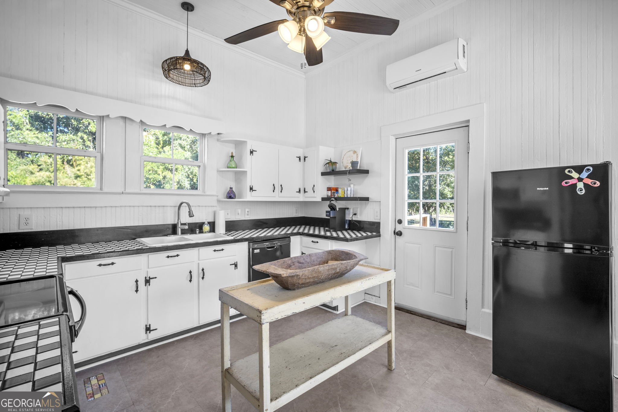 295 South Lewis Street Metter, GA 30439 - Photo 14 of 24 a kitchen with a refrigerator and a sink