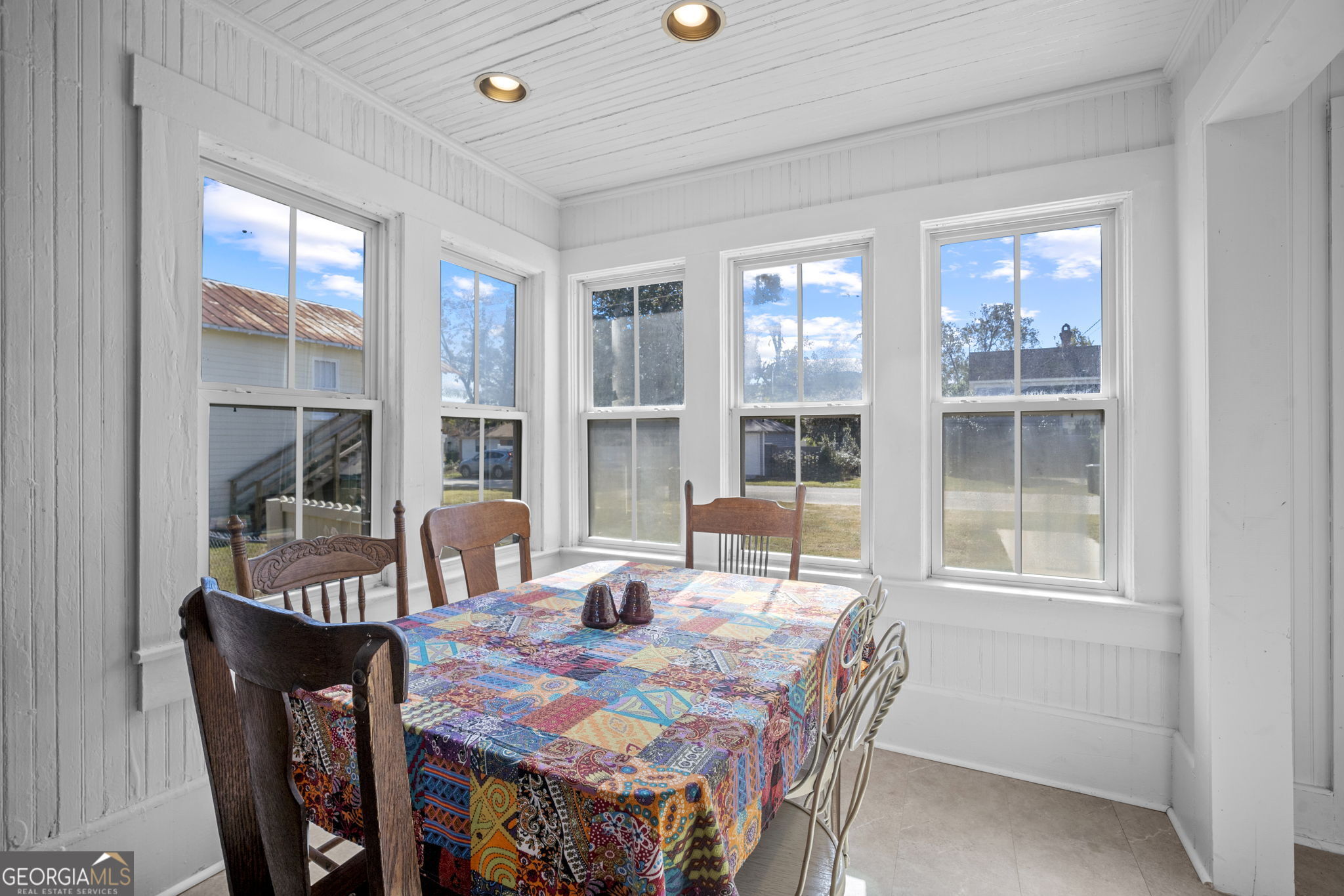 295 South Lewis Street Metter, GA 30439 - Photo 17 of 24 a view of a dining room with furniture window and outside view