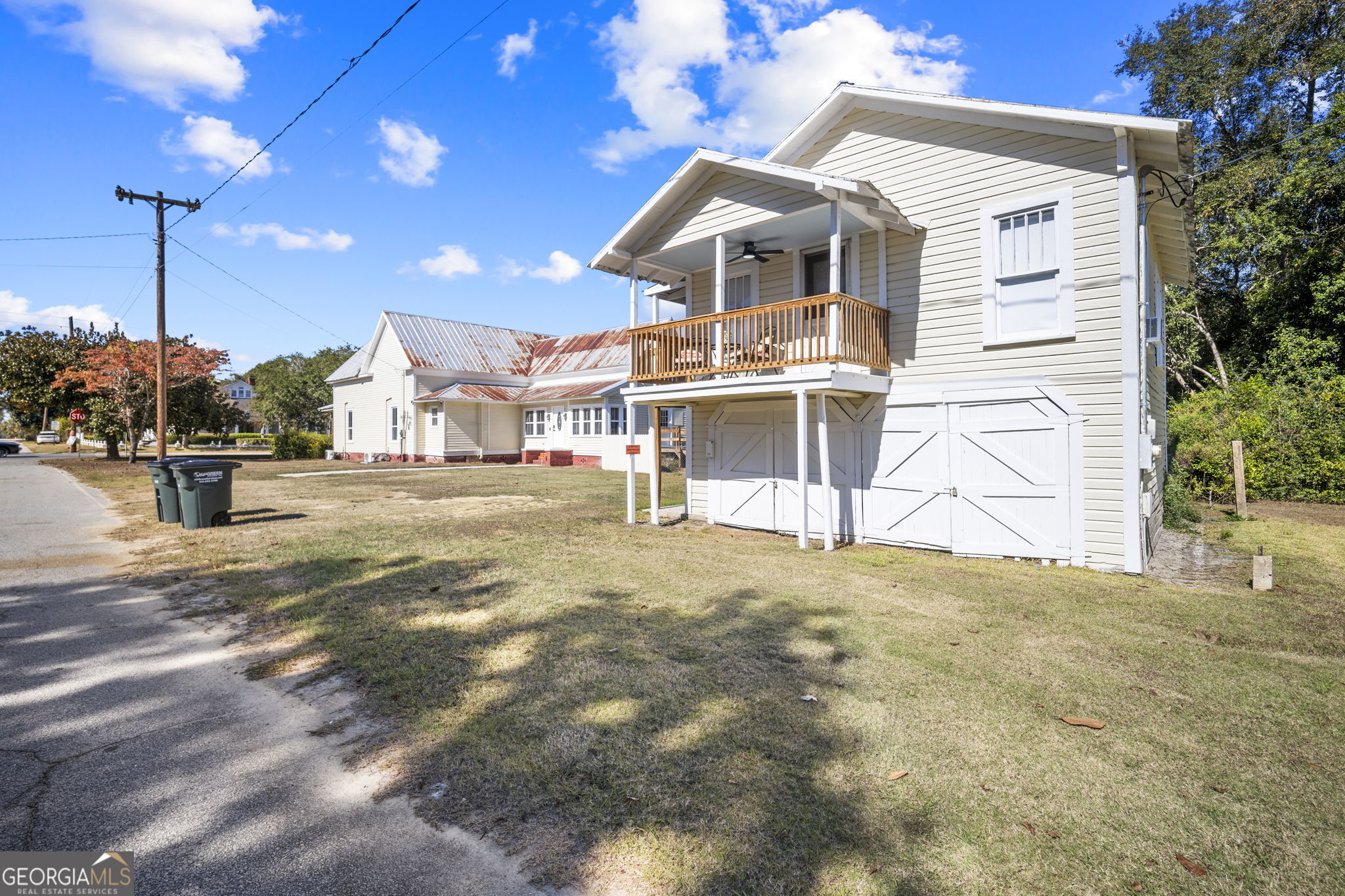 295 South Lewis Street Metter, GA 30439 - Photo 24 of 24 a front view of a house with a yard