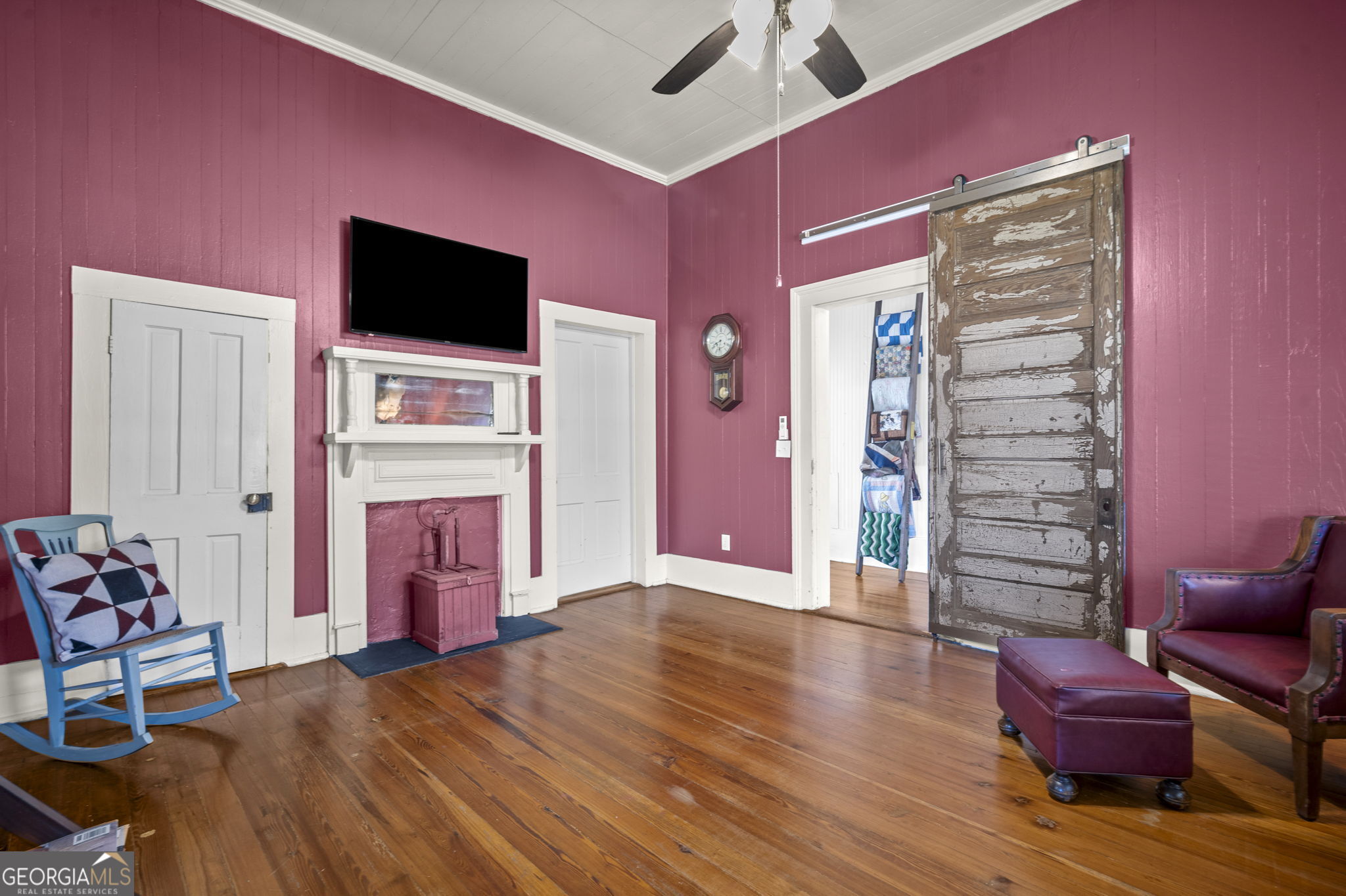 295 South Lewis Street Metter, GA 30439 - Photo 4 of 24 a view of livingroom with furniture and a flat screen tv