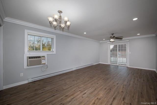 1314 Smithtown Avenue, Unit 29 Bohemia, NY 11716 - Photo 4 of 8 a view of an empty room with wooden floor and a window