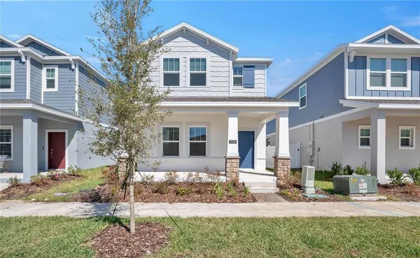 front view of a house with a yard
