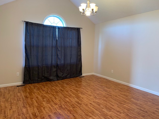 178 Camargo Road Fayetteville, TN 37334 - Photo 8 of 14 a view of wooden floor and chandelier in a room