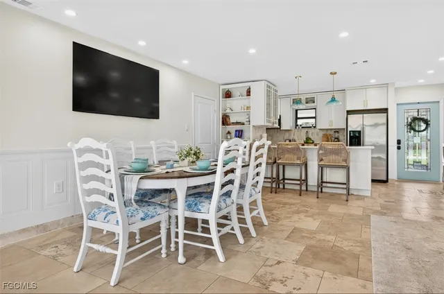 a view of a dining room with furniture