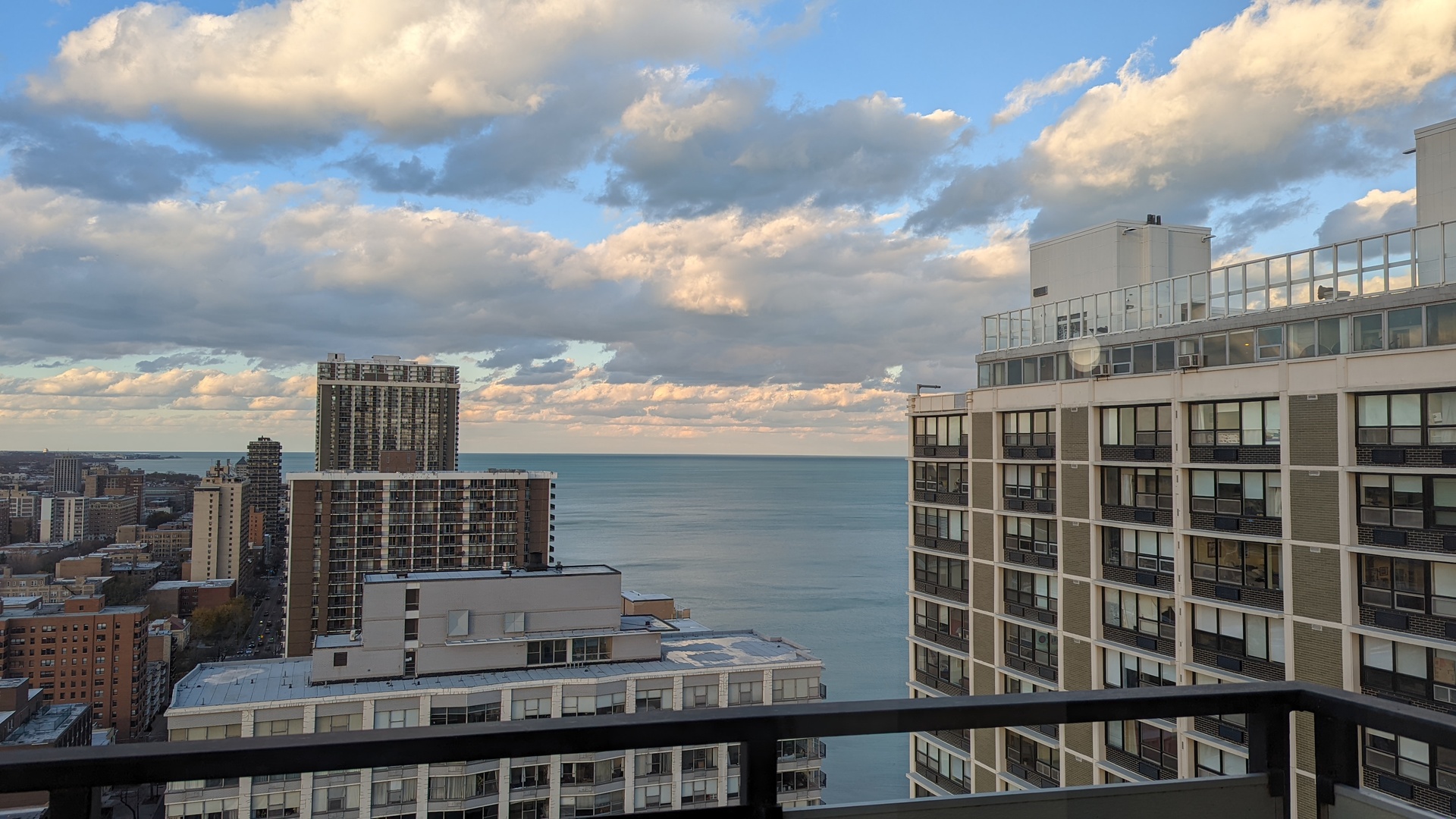 5701 North Sheridan Road, Unit 30B Chicago, IL 60660 - Photo 6 of 9 a view of a city with tall buildings