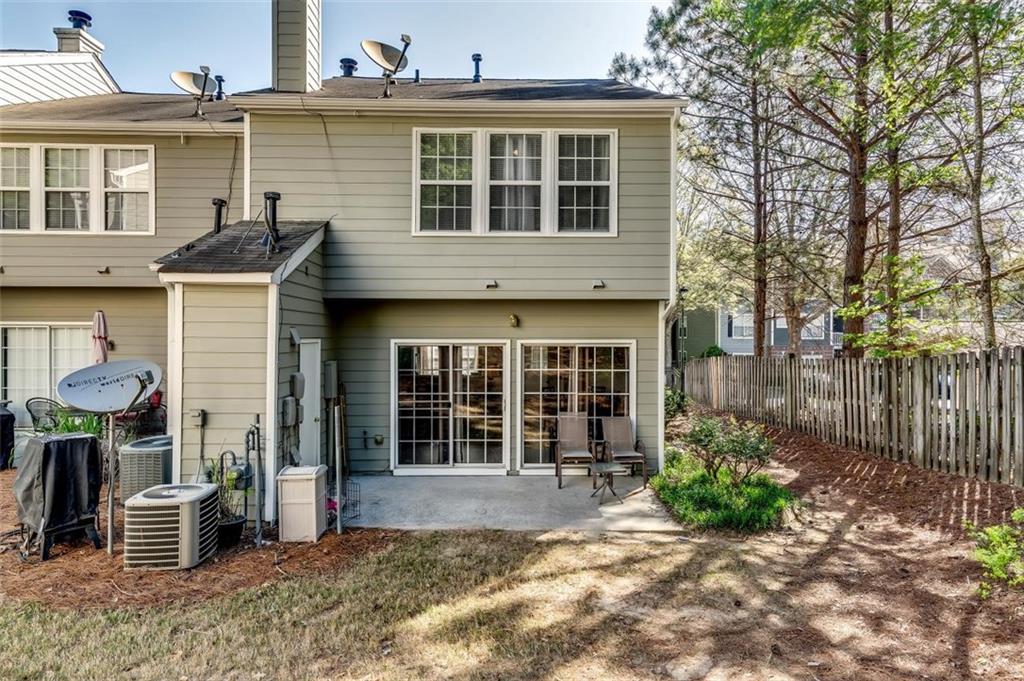 4175 Howell Park Road Duluth, GA 30096 - Photo 24 of 36 a front view of a house with a yard