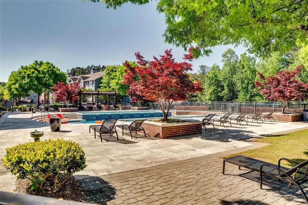 4175 Howell Park Road Duluth, GA 30096 - Photo 28 of 36 a view of a swimming pool with outdoor seating