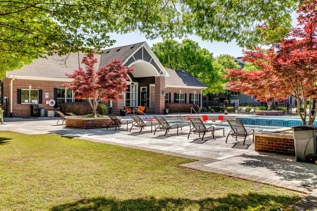 4175 Howell Park Road Duluth, GA 30096 - Photo 29 of 36 a view of house with swimming pool and sitting area