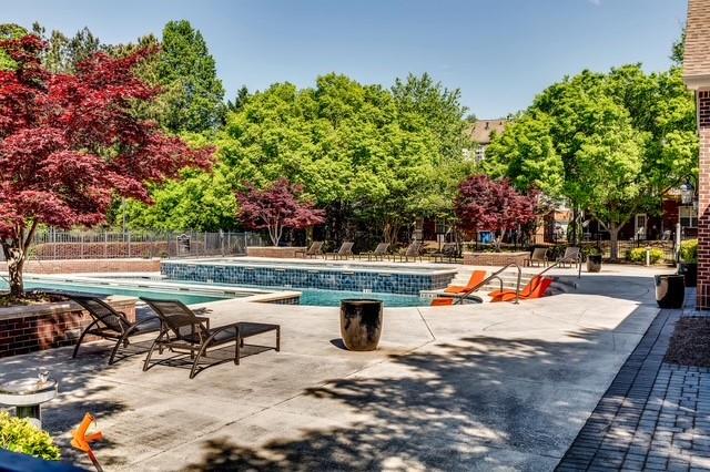 4175 Howell Park Road Duluth, GA 30096 - Photo 31 of 36 a view of a swimming pool with a patio