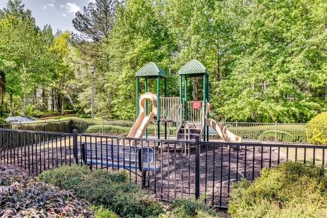 4175 Howell Park Road Duluth, GA 30096 - Photo 32 of 36 a view of a deck with a large garden