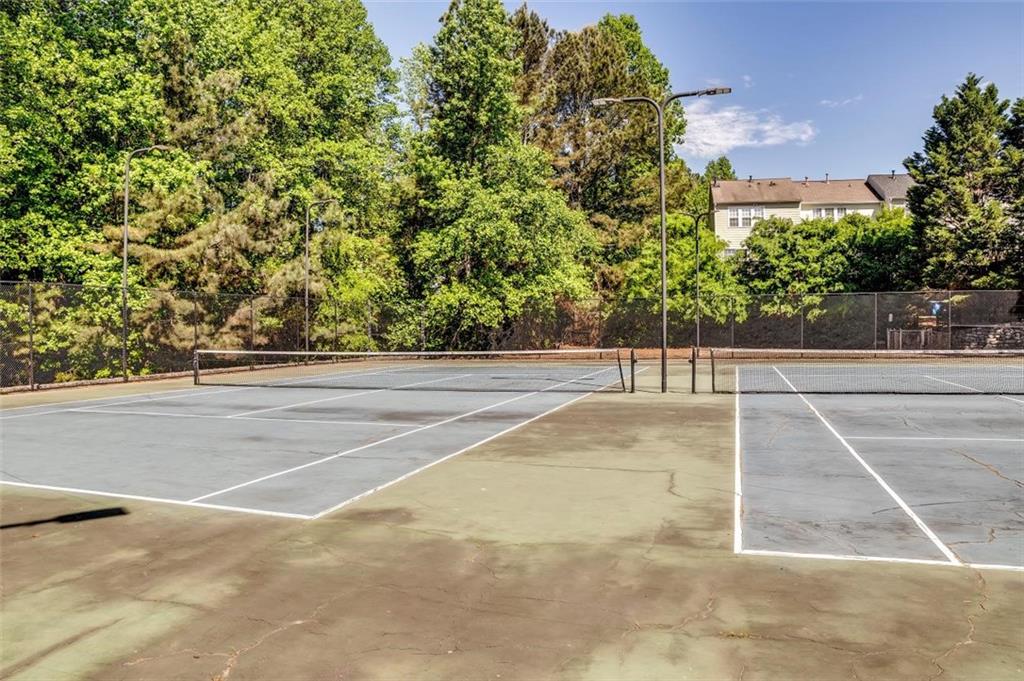 4175 Howell Park Road Duluth, GA 30096 - Photo 34 of 36 a view of a tennis court