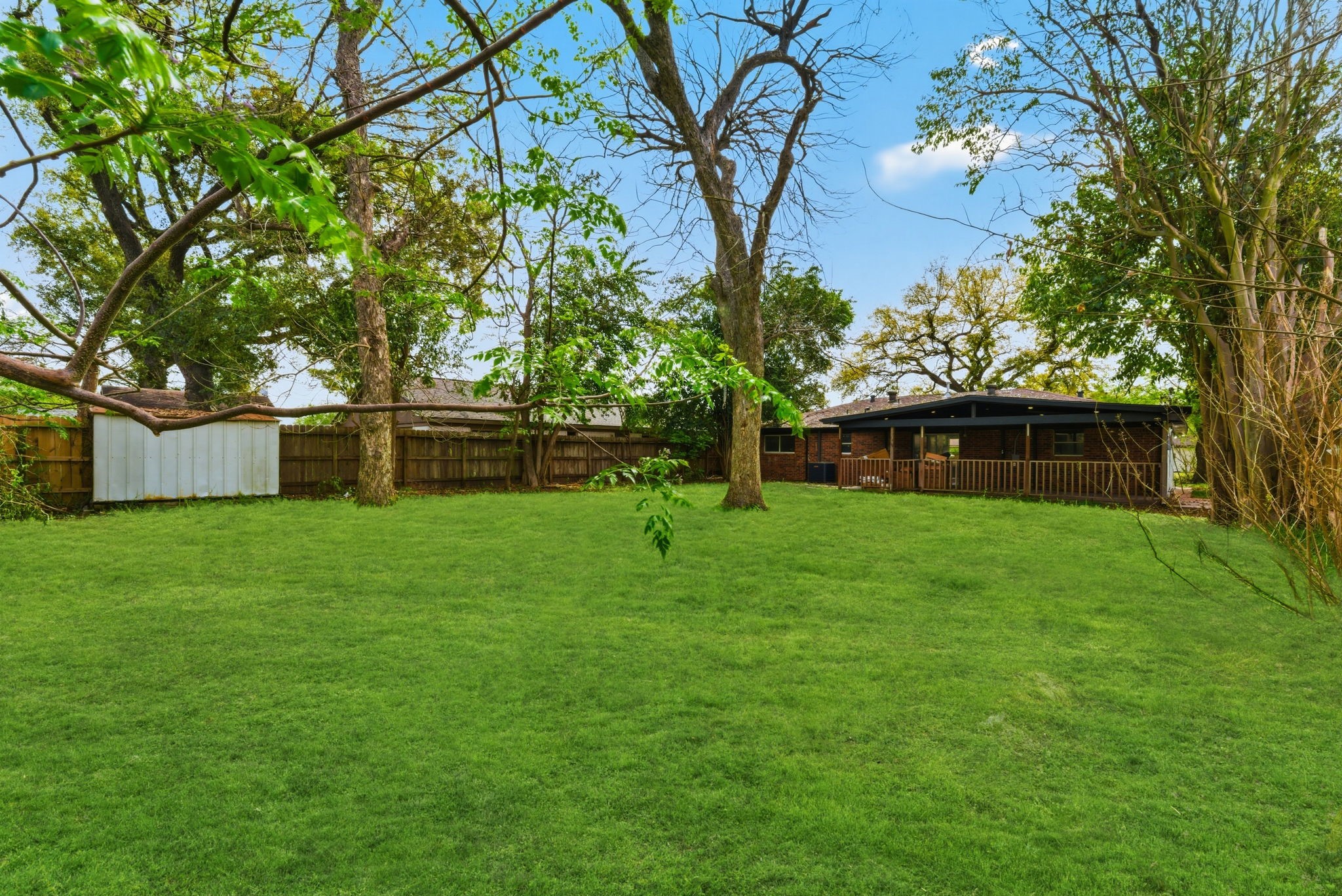 910 Beaver Bend Road Houston, TX 77088 - Photo 31 of 48 a front view of a house with garden
