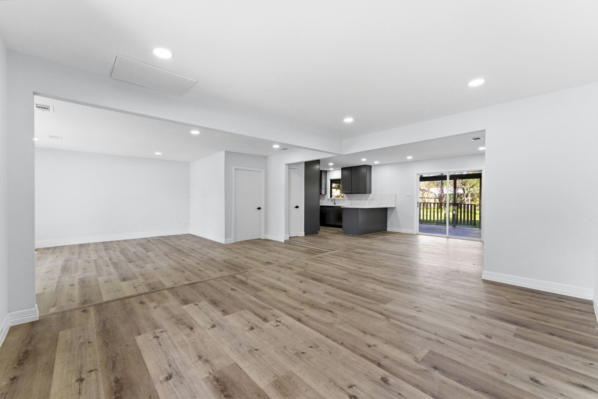 910 Beaver Bend Road Houston, TX 77088 - Photo 37 of 48 Walk in and instantly feel the difference. Wide open, light-filled, and ready to be styled exactly the way you want, whether it’s cozy nights in or hosting a full house.