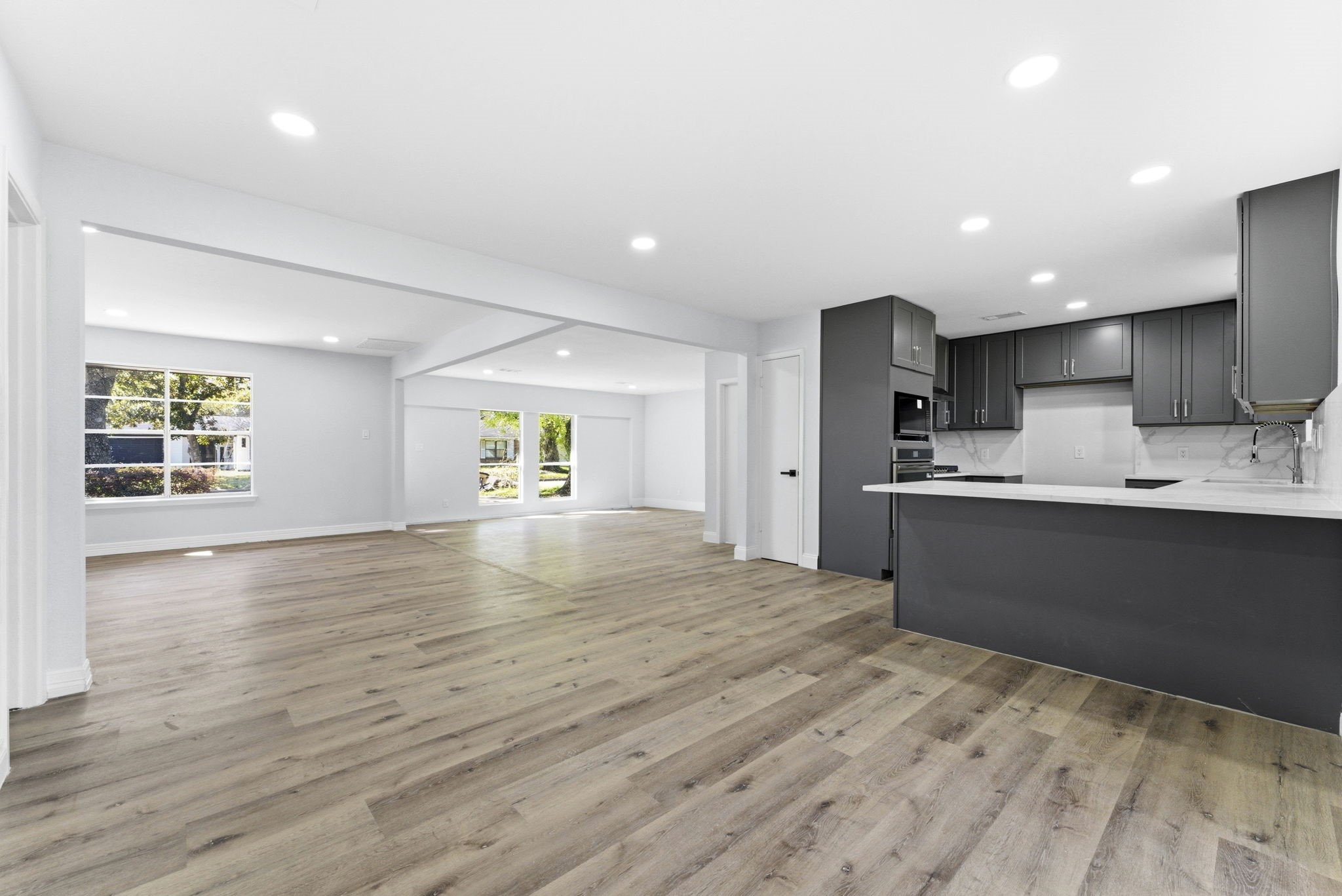 910 Beaver Bend Road Houston, TX 77088 - Photo 39 of 48 From morning coffee at the island to evening gatherings, this kitchen was designed to be the heart of everyday living.
