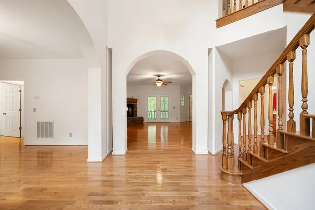 a bathroom with a sink a mirror and a shower