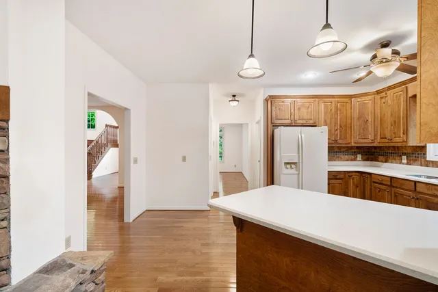 a bathroom with a sink mirror and vanity