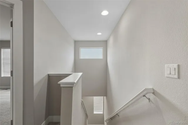 a view of a hallway with closet area