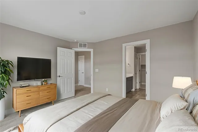 a bathroom with a sink double vanity and a mirror