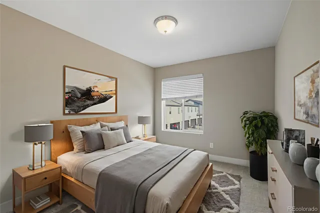 a bathroom with a sink toilet vanity and mirror