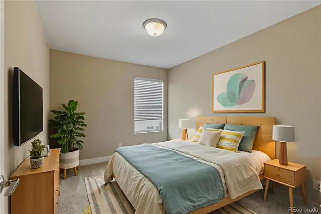 a bedroom with a bed and walk in closet