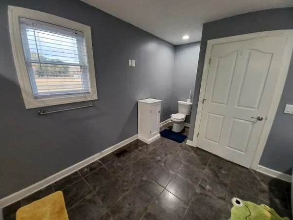 a view of a hallway with entryway