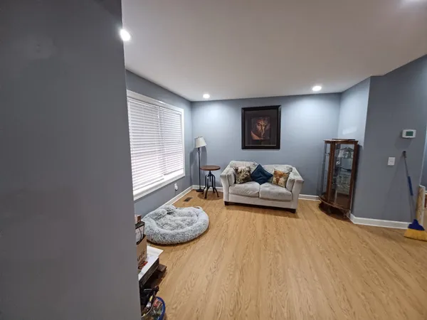 a living room with furniture and a table