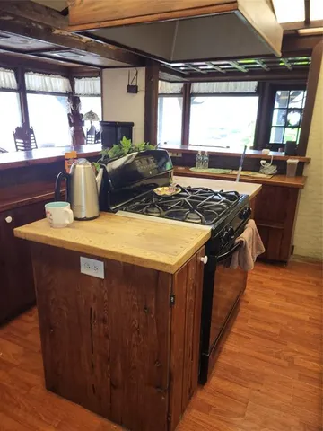 a bathroom with a bathtub and toilet