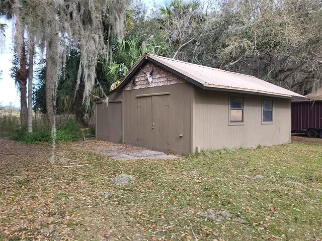 a view of a room with lots of wooden furniture