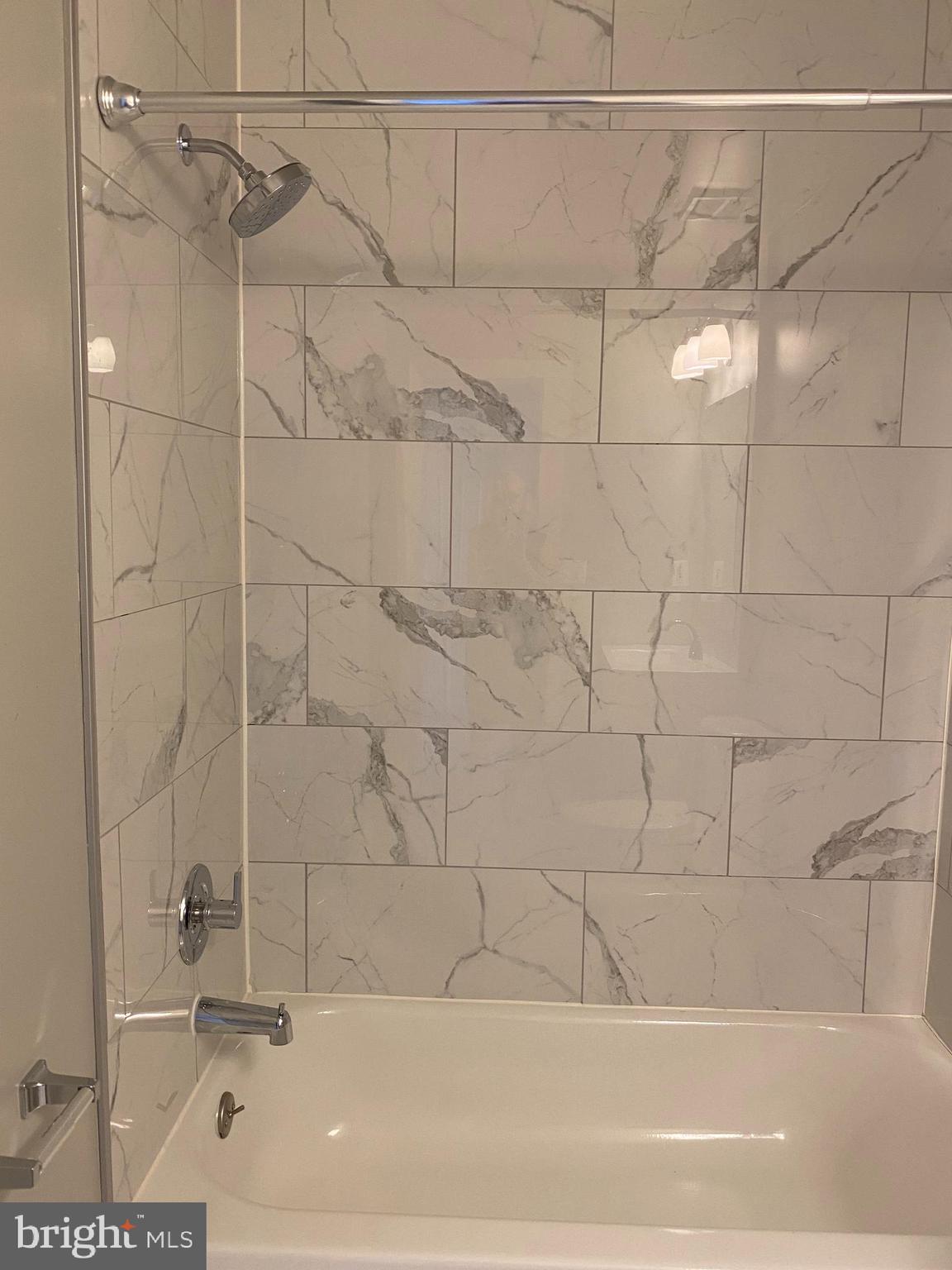 12307 Newcastle Loop Woodbridge, VA 22192 - Photo 10 of 15 MBR newly replaced tile and sink w cabinet